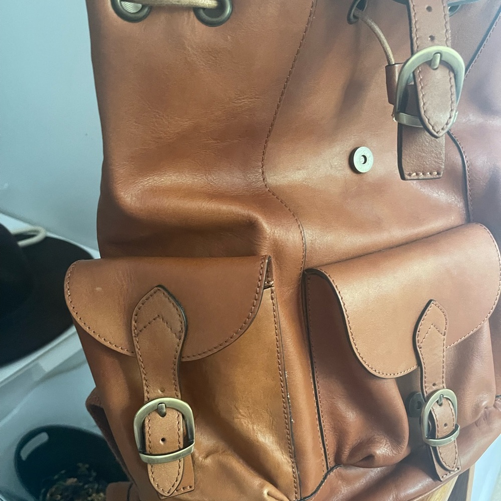 It’s a genuine, leather backpack. Never been used, but it’s not brand new.